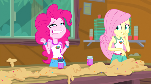 File:Fluttershy getting amused by Pinkie Pie's antics EG4b.png