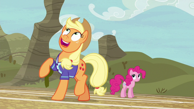 File:Applejack looks at the ball smiling S6E18.png
