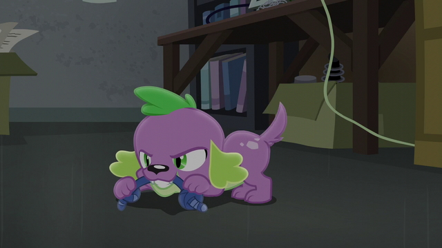 File:Spike chews on a chew toy EG3.png