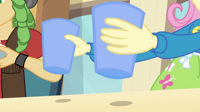 File:Fluttershy banging cups on the table EG.png