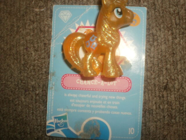 File:Chance-A-Lot glitter minifigure toy.jpg