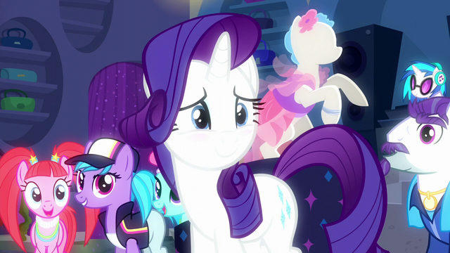 File:Rarity looks at her friends while blushing S6E9.png