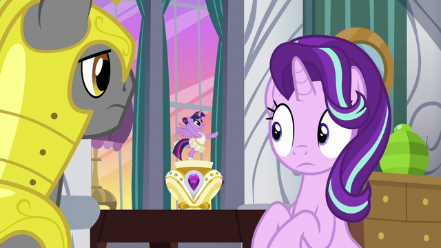 File:Starlight looks innocently at music box Twilight S7E10.png