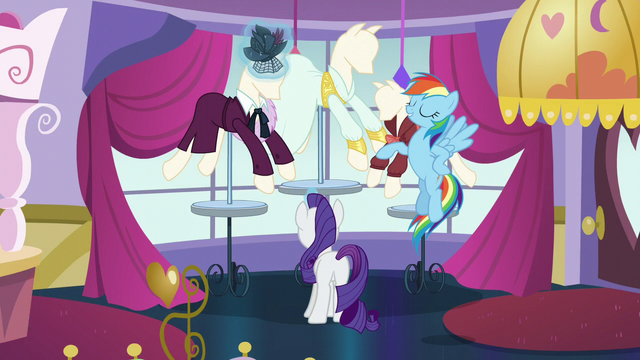 File:Rainbow explains why she's in Canterlot; Rarity continues adjusting hat S5E15.png