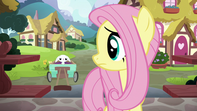 File:Fluttershy looking back at sad Angel S7E5.png