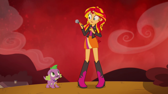 File:Sunset holds microphone EG2.png