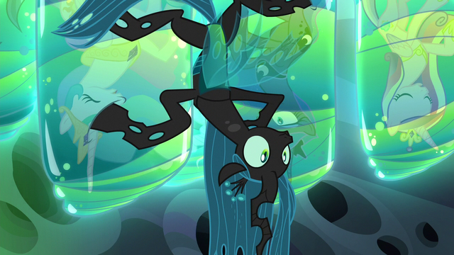 File:Queen Chrysalis appears from behind cocoons S6E26.png