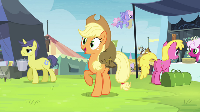 File:Applejack finds Rarity in the crowd S4E22.png