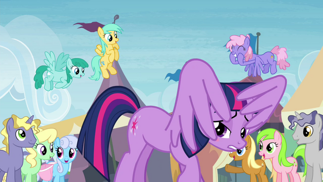 File:Twilight underneath her own wings at the exchange S4E22.png