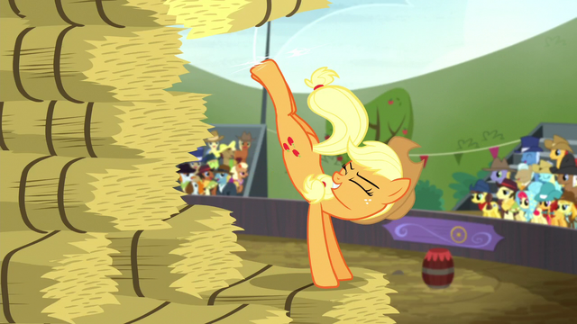 File:Applejack kicks up another hay bale S5E6.png