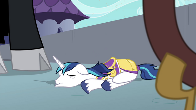 File:Shining Armor on the ground powerless S4E26.png