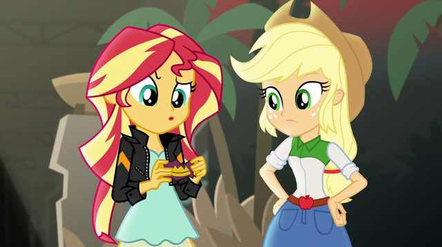 File:Sunset Shimmer holding a candy wrapper EGS2.png