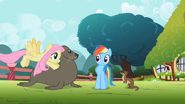 File:Fluttershy pushing seal S2E07.png