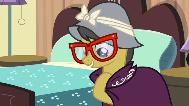 File:A. K. Yearling tucks amulet into her cloak S6E13.png