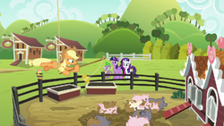 Spike, Twilight, and Rarity see AJ hanging from a rope S6E10