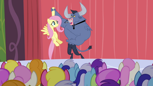 File:Iron Will holding Fluttershy S2E19.png