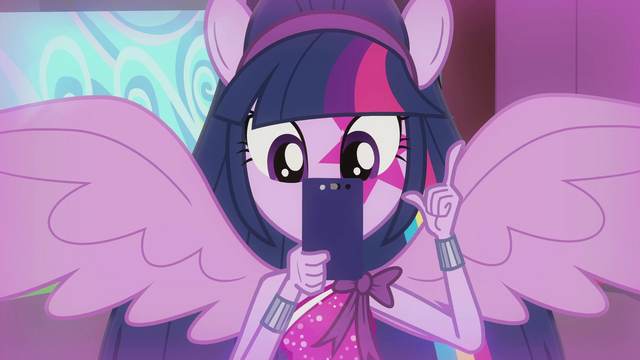 File:Twilight taking a picture with her phone EG2.png