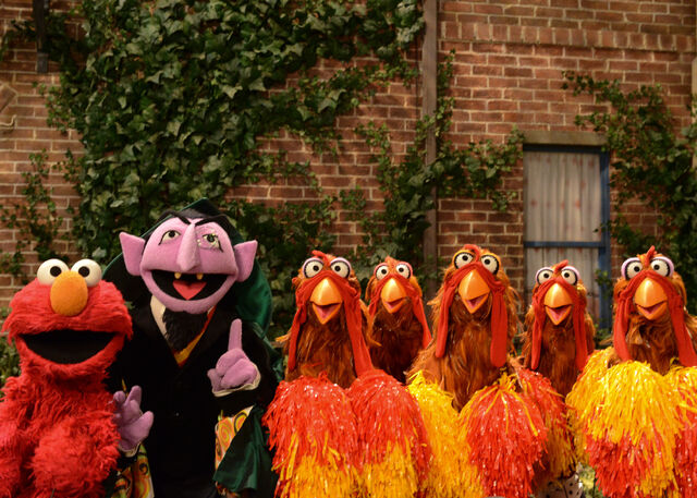 File:Elmo-the-count-chickens.jpg