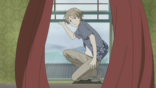File:Natsume looking back before jumping.jpg