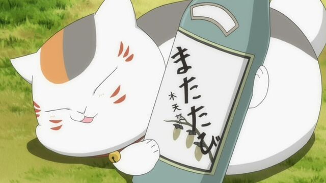 File:Madara with sake bottle.jpg
