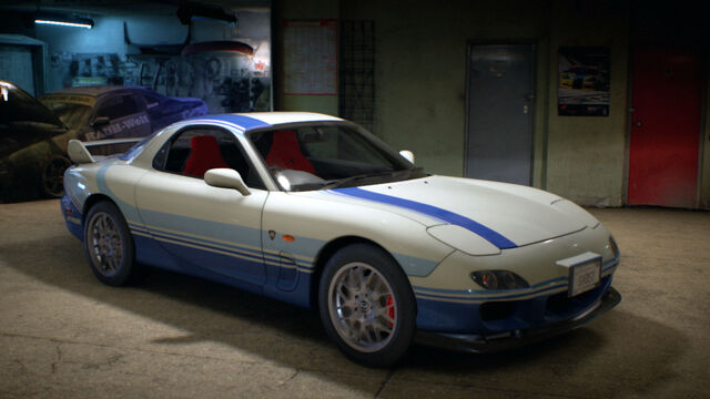 File:NFS2015MazdaRX7SpiritR2002PoloGarage.jpg