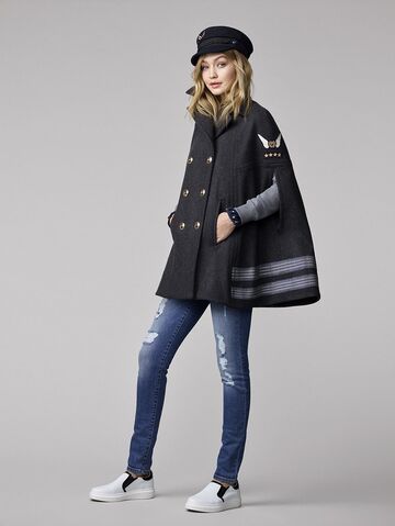 File:When-weather-gets-cooler-Gigi-can-slip-her-poncho.jpg