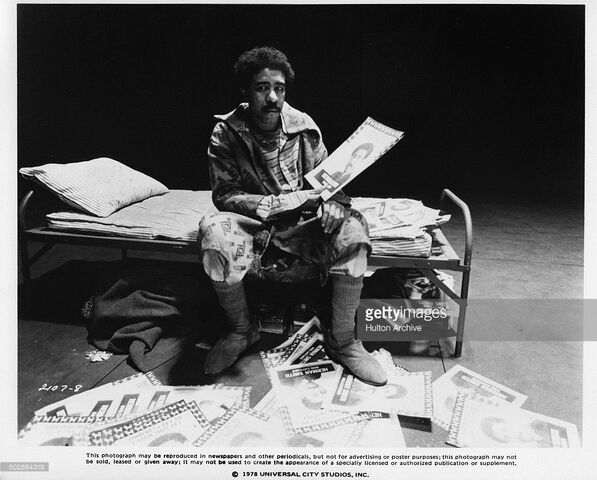 File:Richard-pryor-as-the-wiz-sits-on-a-cot-in-a-scene-for-the-universal-picture-id502864319.jpg