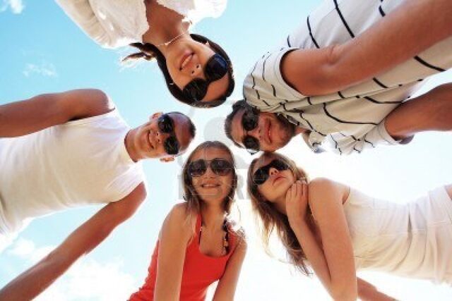 File:5530794-cheerful-young-people-having-fun-on-a-beach-great-summer-holidays.jpg