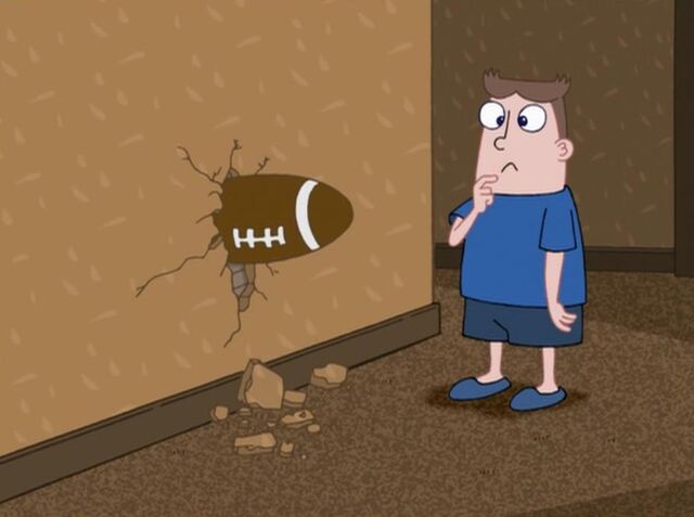 File:Football in the wall.jpg
