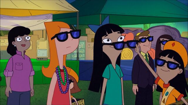 File:Ginger putting glasses on her sister.jpg