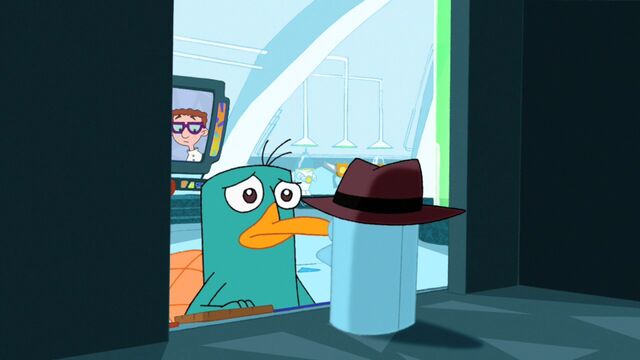 File:Agent P putting away his fedora.jpg