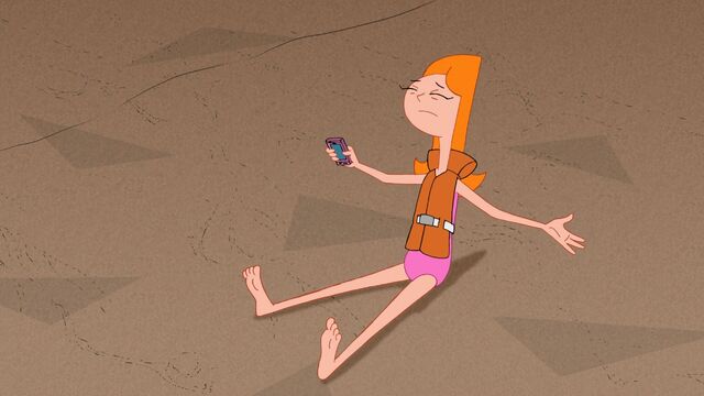 File:Candace starting to lie back down on the sand.jpg