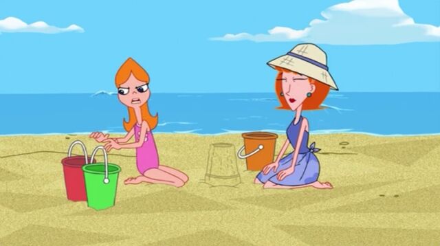 File:Candace grabbing the buckets to start building the sandcastle.jpg