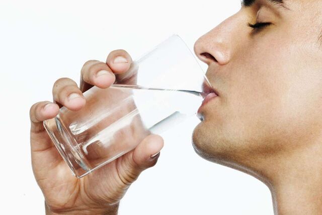 File:Man drinking Water Glass.jpg