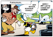 DonaldDuckDécouvreStatueEnOrÀBouloulou