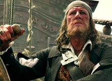 Barbossa z kołem sterowym.png