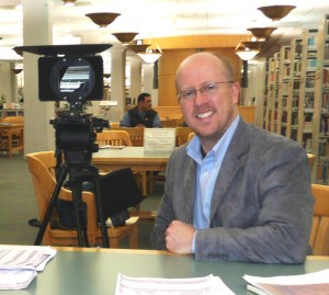 File:Doc-with-camera-300x269.jpg