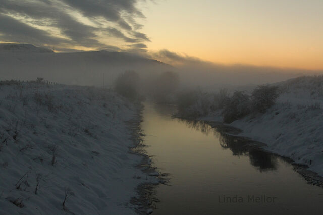 File:Snowy-freezing-sunset.jpg