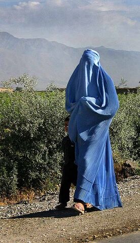 File:Woman walking in Afghanistan.jpg