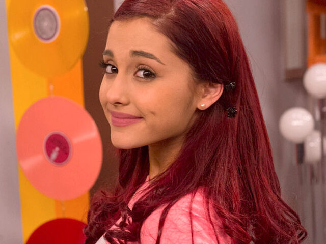 File:Cat wearing earrings.jpg