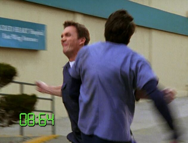File:5x16-Janitor tackles J.D..jpg