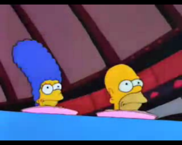 File:MargeAndHomerLookLikeTheyAreBeingServedAsDinner.png