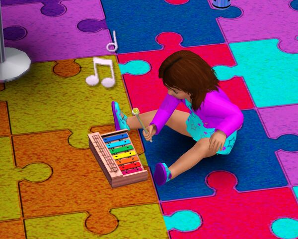 File:Baby playing with xylophone.jpg