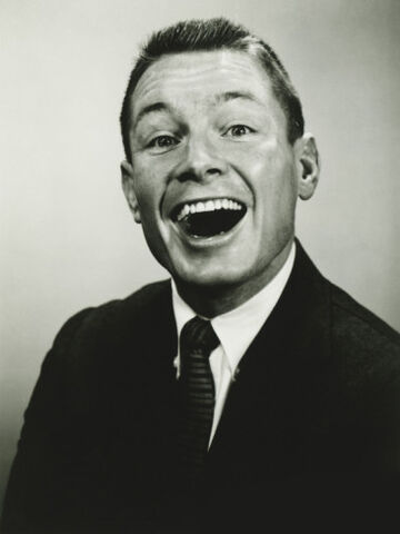 File:George-marks-man-making-laughing-face-in-studio-close-up.jpg