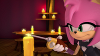 Amy lighting candle