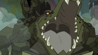Cragadile attacking
