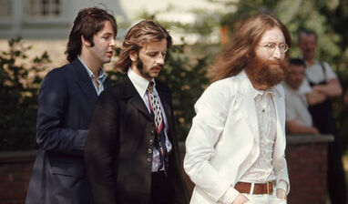 Iconic-white-suit-john-lennon-abbey-road