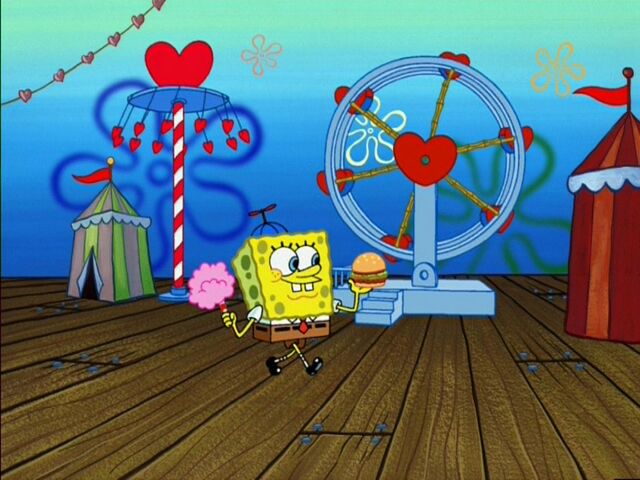File:Spongebob Wearing 1 hat & holding cotton Candy & 1 Krabby Patty @ the Valentine's Day Carnival.jpg