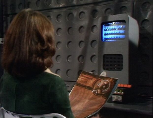 File:Sarah reading space news cover RotC.jpg