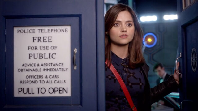 File:Clara looks out of TARDIS.jpg